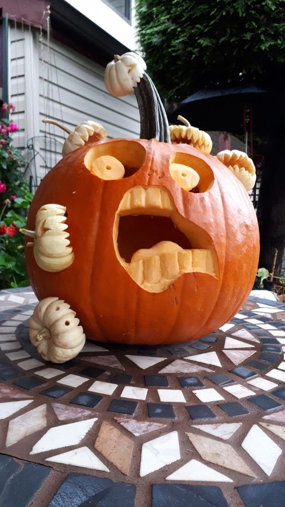 20 Crazy Creative Pumpkin Carving Ideas - The Unlikely Hostess