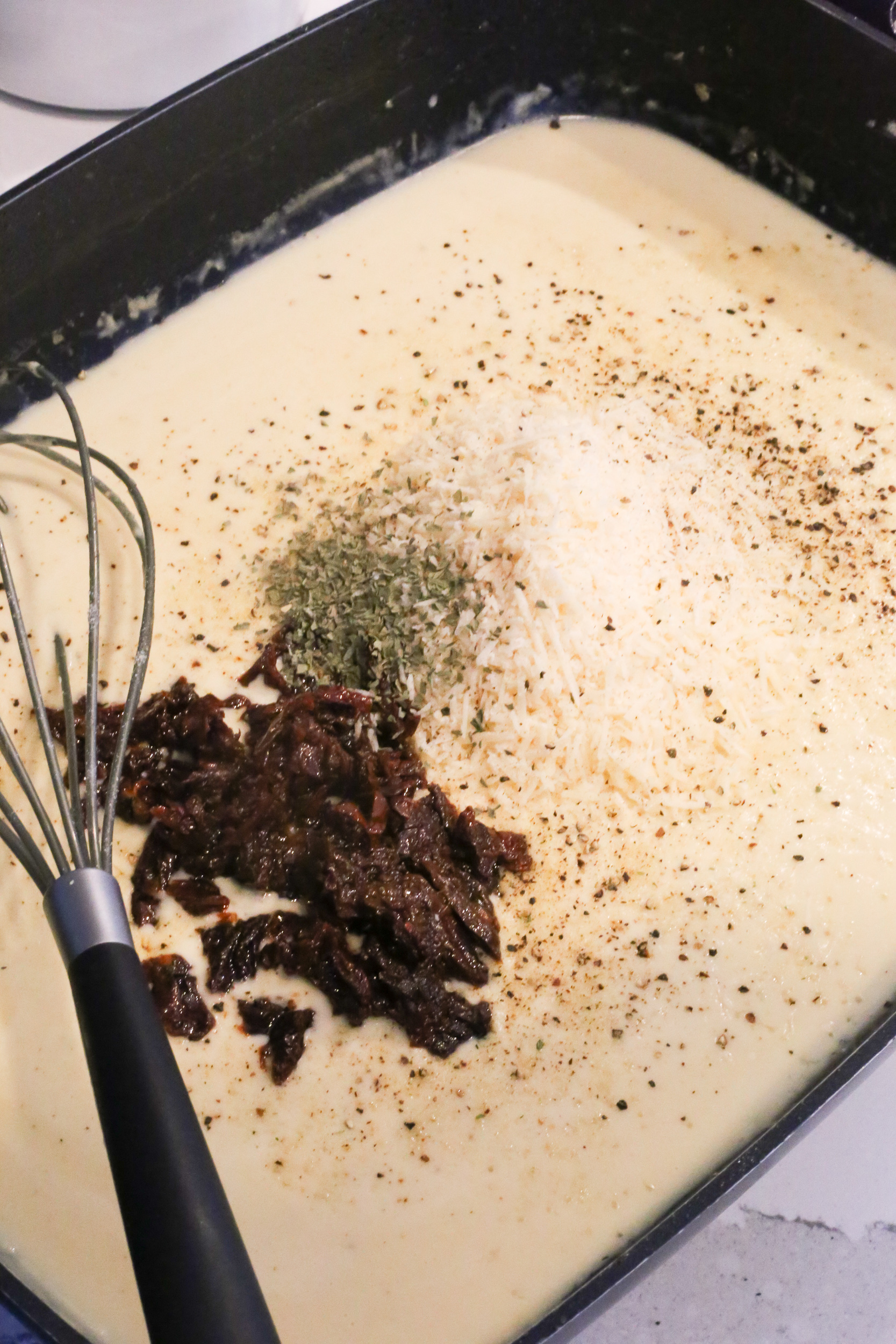 Creamy Sun Dried Tomato Chicken Pasta with Bacon - The Unlikely Hostess