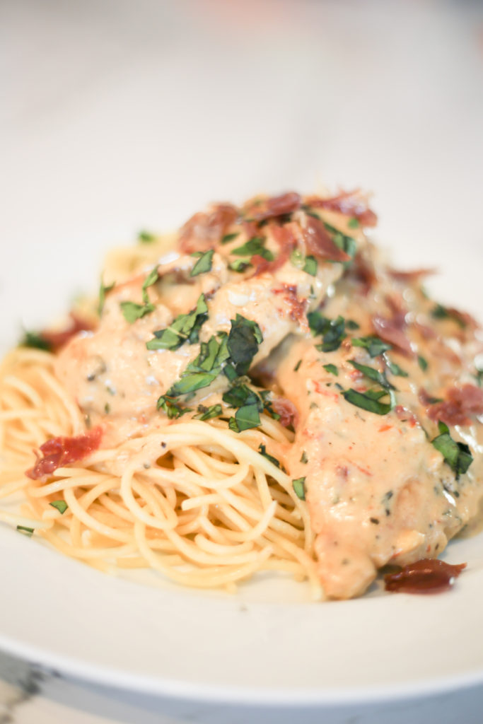 creamy sun dried tomato chicken pasta with bacon