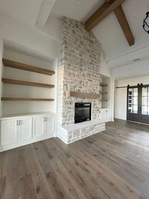 farmhouse fireplace with built ins
