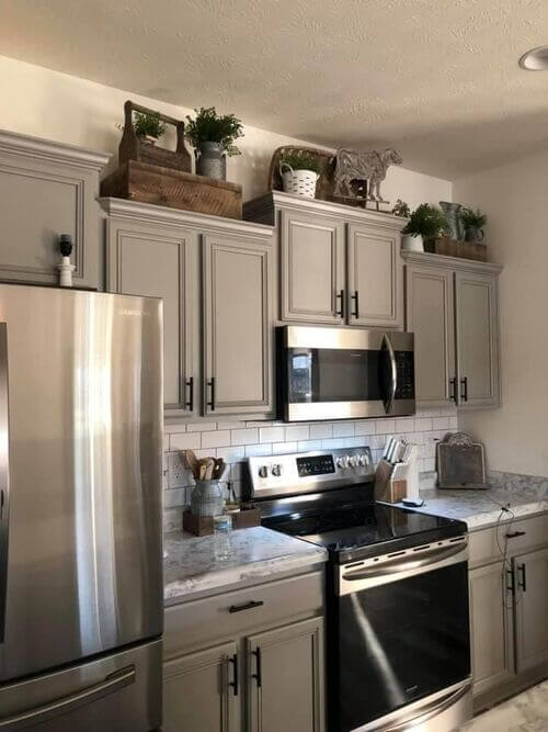 above kitchen cabinet decor idea